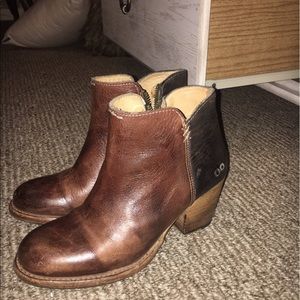 brown and black bed stu booties.